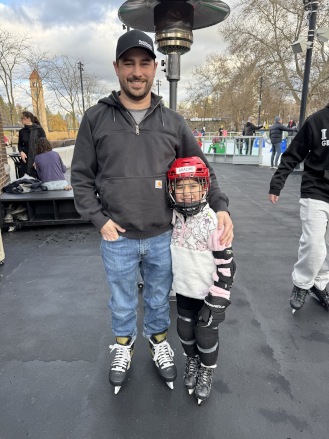 Collin Alligood, programmer for Yakindo Web Designs standing next to his daughter.